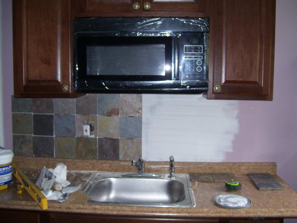 Monroe microwave install and back splash install